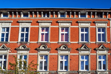 brick  facade of the historic building in Gniezno.