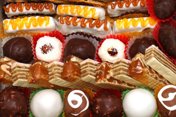 Sweet cakes pile background