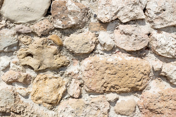 The texture of the stone wall close-up