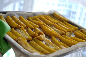 Baked potatoes on a baking sheet