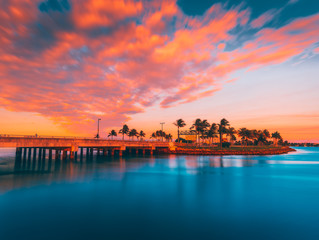 sunset palms summer orange tourism vacation water sea sun sky clouds sunrise beautiful impressions nature dusk beach river red blue dawn © Alberto GV PHOTOGRAP
