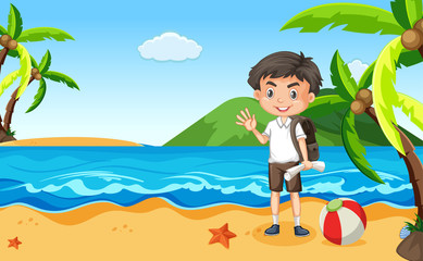 Obraz na płótnie Canvas Ocean scene with happy boy waving hello on the beach