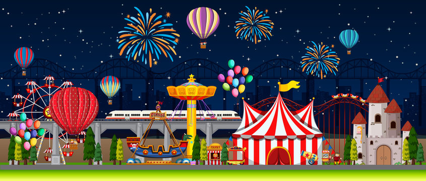 Themepark scene with many rides at night