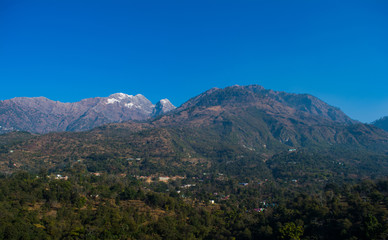 himalayan mountain range covered with the snow at patnitop a city of Jammu, Winter landscape
