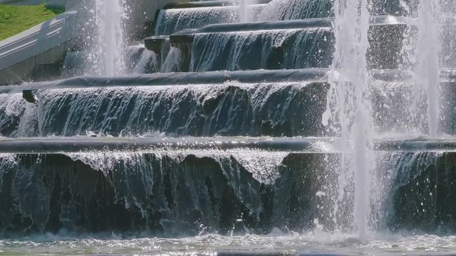 Fountain detail of the water cascades at the Belvedere historic gardens in Wien, slowmotion video.