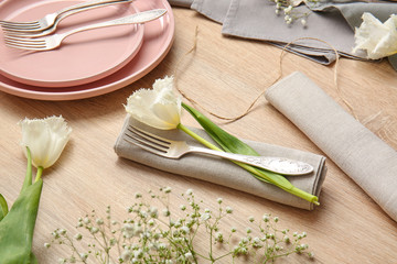 Beautiful table setting on wooden background