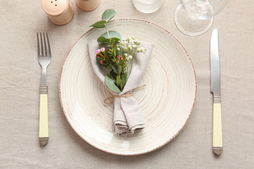 Beautiful table setting with floral decor