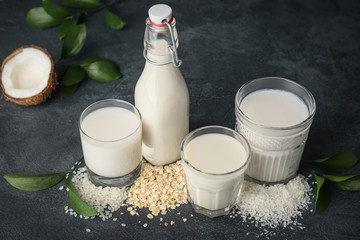 Different milk on dark background