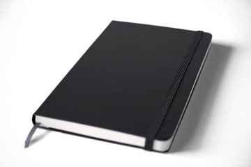 Leather sketchbook with blank cover isolated on white. 3d illustration.