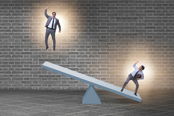 Competition concept with businessman and seesaw