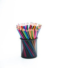 Arts and Craft Ideas. Bunch of Colored Wooden Pencils Placed Together in Metal Round Holder. Isolated Over White.