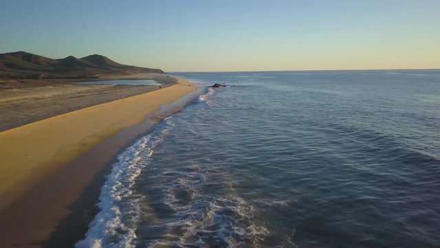 Heavenly Cabo San Lucas, Mexico, Aerial View of Sandy Coastline and Pacific Ocean Under Golden Hour Sunlight