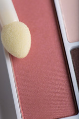 Beauty concept, Close up Beautiful bright eye shadows box and make up brush and copy area