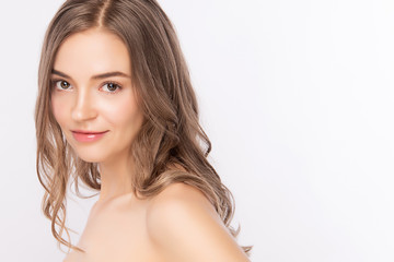 Fototapeta premium Beautiful Young Woman with Clean Fresh Healthy Skin, Facial treatment. Cosmetology, beauty and spa, isolated on white background