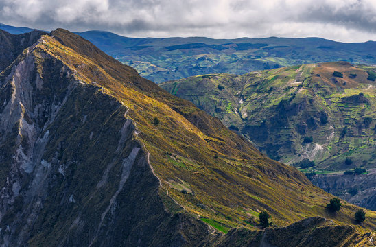 The hiking path leading to the highest peak along the Quilotoa Loop around the volcanic Crater Lake, south of Quito, Ecuador.