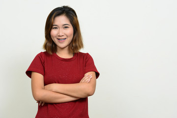 Fototapeta premium Portrait of young Asian woman with short hair