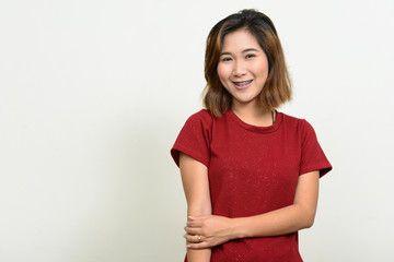 Portrait of young Asian woman with short hair