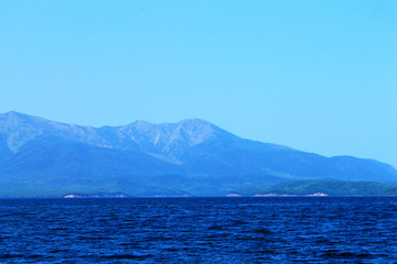 blue sea and mountains