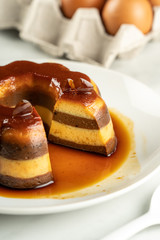 sweetened caramel pudding layered with chocolate taste