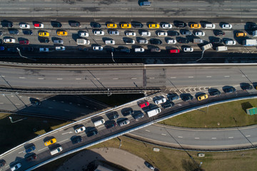 MOSCOW, RUSSIA - APRIL 15, 2020: An aerial view of a traffic congestion on an interchange of Mozhaiskoye Shosse and  Moscow Ring Road during the pandemic of the novel coronavirus disease (COVID-19)