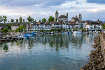 View of the Rapperswil harbour and altstadt (old city) dominated by its castle and Stadtpfarrkirche (St. John's Church), Rapperswil-Jona, St. Gallen, Switzerland