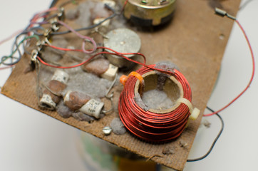 An old red wire electrical circuit board 