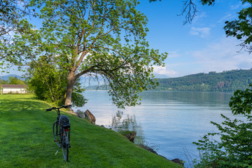Bike ride along the beautiful shores of the Upper Zurich Lake (Obersee) near Bollingen, St. Gallen