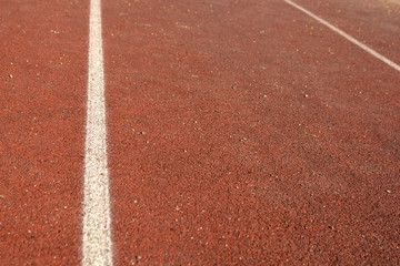 Fototapeta premium Running track rubber with line. Healthy lifestyle
