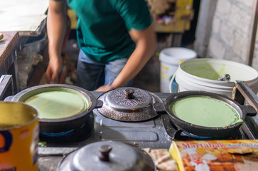Preparing Terang bulan Indonesia in Bali, Indonesia
