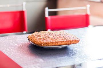 Homemade bread lies in a kitchen with a modern interior