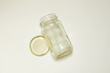 Glass jar on white background