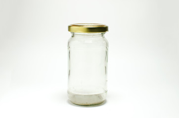 Glass jar on white background