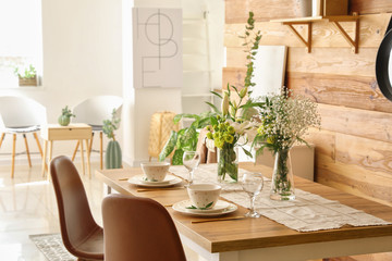 Served table in modern dining room