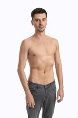Fototapeta premium Young man with anorexia on white background