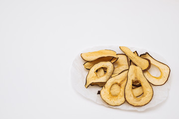 Vegetarian pear chips on a light background