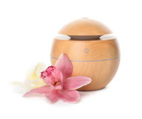 Aroma oil diffuser on white background