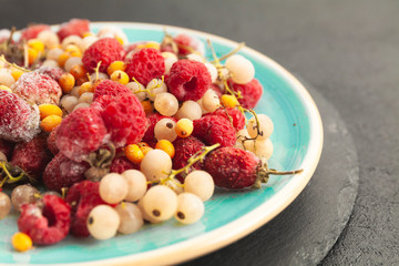 Set of frozen summer berries. Vitamin dessert in  winter.