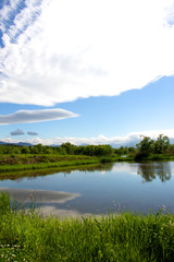 Park view with lake and mountain. forest lake.