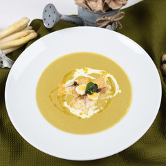 Cream of asparagus soup is a soup prepared with asparagus,stock and milk or cream as ingredients.