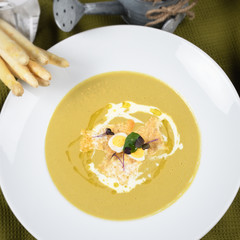 Cream of asparagus soup is a soup prepared with asparagus,stock and milk or cream as ingredients.