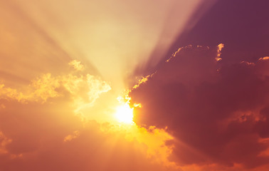 Bright orange color sunset light with sky and clouds