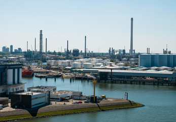 Rotterdam, Netherlands - May 07, 2020: view on the cargo port buildings infrastructure from cruise ship