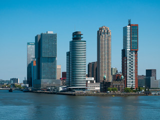 Fototapeta na wymiar Rotterdam, Netherlands - May 07, 2020: view on the cargo port buildings infrastructure from cruise ship