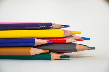 Fototapeta premium coloured pencils on white background