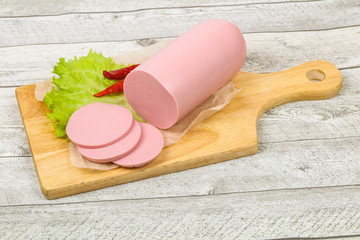 Sliced pork sausage © Andrei Starostin