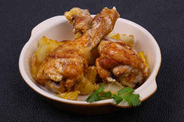 Roasted chicken legs with potato