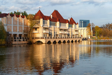 Russia, Moscow, October 2020. A modern replica of a French mansion on the lake.