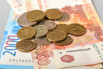 Cash banknotes and coins background. Background of Russian money banknotes. Paper rubles and coins background.