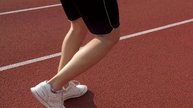 Sprinter in action running on a race track
