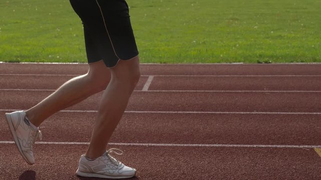 Ahtlete running on the race track